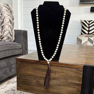 Elegant Pearl Necklace with Brown leather Tassel